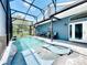 Large screened pool area with plenty of space for lounging and entertaining at 13333 Early Frost Cir, Orlando, FL 32828