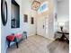Bright and spacious entryway with tile flooring at 13333 Early Frost Cir, Orlando, FL 32828