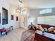 Inviting living room with a neutral color palette and a view of the front entry at 13333 Early Frost Cir, Orlando, FL 32828