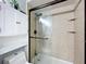 Clean bathroom with a shower/tub combo and updated vanity at 13333 Early Frost Cir, Orlando, FL 32828