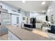 Open kitchen with modern cabinets and a large island at 13333 Early Frost Cir, Orlando, FL 32828