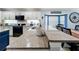 Kitchen boasts a large island and granite countertops at 13333 Early Frost Cir, Orlando, FL 32828