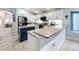 Modern kitchen with granite countertops and stainless steel appliances at 13333 Early Frost Cir, Orlando, FL 32828