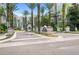 The Grove Resort & Spa community entrance with palm trees at 14501 Grove Resort Ave # 3134, Winter Garden, FL 34787