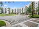 Modern building with attractive landscaping and a fountain at 14501 Grove Resort Ave # 3134, Winter Garden, FL 34787