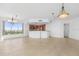 Modern kitchen features a breakfast bar and stainless steel appliances at 231 Riverside Drive # 1209-1, Holly Hill, FL 32117