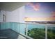 Spacious balcony overlooking a scenic waterfront and cityscape at 231 Riverside Drive # 1209-1, Holly Hill, FL 32117