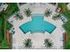Overhead view of resort-style pool and surrounding patio at 231 Riverside Drive # 1209-1, Holly Hill, FL 32117