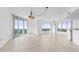 Bright and spacious living room with large windows and city views at 231 Riverside Drive # 1209-1, Holly Hill, FL 32117