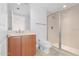 Clean bathroom with a modern vanity, toilet and shower stall at 231 Riverside Drive # 1209-1, Holly Hill, FL 32117