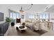 Modern living room featuring stylish furniture and large windows at 231 Riverside Drive # 1209-1, Holly Hill, FL 32117