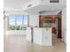 Kitchen with breakfast bar and modern cabinetry at 231 Riverside Drive # 1209-1, Holly Hill, FL 32117