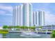 Two high-rise condo buildings with water fountain at 231 Riverside Drive # 1209-1, Holly Hill, FL 32117