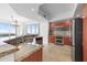 Modern kitchen with stainless steel appliances and granite countertops at 231 Riverside Drive # 1209-1, Holly Hill, FL 32117