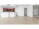 Modern kitchen with granite counters and stainless steel appliances at 231 Riverside Drive # 1209-1, Holly Hill, FL 32117