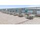Lined lounge chairs on a patio overlooking the water at 231 Riverside Drive # 1209-1, Holly Hill, FL 32117