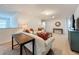 Spacious bonus room with comfy seating and a large TV at 8829 Corcovado Dr, Kissimmee, FL 34747