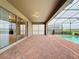 Spacious covered patio with pool access at 8829 Corcovado Dr, Kissimmee, FL 34747