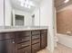 Bathroom with double vanity and tub at 8829 Corcovado Dr, Kissimmee, FL 34747