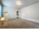 Large bedroom with neutral decor and carpet flooring at 8829 Corcovado Dr, Kissimmee, FL 34747