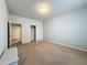 Bright bedroom featuring a large closet and access to a bathroom at 8829 Corcovado Dr, Kissimmee, FL 34747