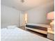 Well-lit bedroom featuring two twin beds and access to another room at 8829 Corcovado Dr, Kissimmee, FL 34747