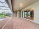 Covered patio, pool access, sliding doors at 8829 Corcovado Dr, Kissimmee, FL 34747