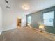 Spacious bedroom with neutral carpeting and en-suite bathroom at 8829 Corcovado Dr, Kissimmee, FL 34747