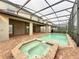 Inviting pool and spa with covered patio at 8829 Corcovado Dr, Kissimmee, FL 34747