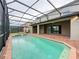 Screened pool and spa with brick pavers at 8829 Corcovado Dr, Kissimmee, FL 34747