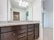 Double vanity bathroom with granite countertop at 8829 Corcovado Dr, Kissimmee, FL 34747