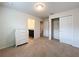 Bedroom with white dresser and closet at 8829 Corcovado Dr, Kissimmee, FL 34747
