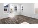 Bright bedroom with hardwood floors and large windows at 2122 Whitney Marsh Aly, Orlando, FL 32804