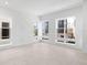 Spacious common area with large windows and tile floors at 2122 Whitney Marsh Aly, Orlando, FL 32804