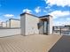 Modern rooftop deck features a private door and city views at 2122 Whitney Marsh Aly, Orlando, FL 32804