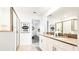 Bathroom with double vanity and a walk-in shower at 2965 Protagonist St, Kissimmee, FL 34746