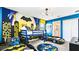 Two themed twin beds with Batman decor at 2965 Protagonist St, Kissimmee, FL 34746