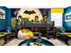 ' bedroom with a Batman theme, bunk beds, and beanbag chairs at 2965 Protagonist St, Kissimmee, FL 34746