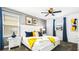 Charming bedroom with a white bed frame and yellow accents at 2965 Protagonist St, Kissimmee, FL 34746