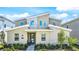 Modern two-story home with stone accents and landscaping at 2965 Protagonist St, Kissimmee, FL 34746