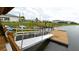 Community kayak launch with multiple kayaks and a floating dock at 2965 Protagonist St, Kissimmee, FL 34746