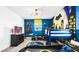 Fun ' bedroom with a Batman theme, bunk beds, and a TV at 2965 Protagonist St, Kissimmee, FL 34746