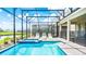Enjoy this screened pool and spa with comfortable lounge chairs at 2965 Protagonist St, Kissimmee, FL 34746