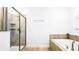 Bathroom with a soaking tub, walk-in shower, and modern fixtures at 2965 Protagonist St, Kissimmee, FL 34746