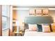 Bedroom with a cozy bed and soft color scheme at 2965 Protagonist St, Kissimmee, FL 34746
