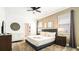 King-size bed, nightstands, and crib in spacious bedroom at 2965 Protagonist St, Kissimmee, FL 34746