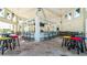Indoor community bar with seating and a large TV at 2965 Protagonist St, Kissimmee, FL 34746