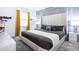 Spacious bedroom with a king-size bed and contemporary furnishings at 2965 Protagonist St, Kissimmee, FL 34746