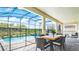 Enjoy outdoor dining on the patio with pool views at 2965 Protagonist St, Kissimmee, FL 34746