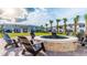 Community fire pit with seating area for residents at 2965 Protagonist St, Kissimmee, FL 34746